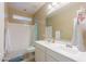 Well lit bathroom features a double sink vanity with white cabinetry and tile flooring at 4557 W South Butte Rd, San Tan Valley, AZ 85144