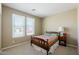 Bright bedroom featuring two large windows, neutral walls, and carpet flooring at 4557 W South Butte Rd, San Tan Valley, AZ 85144