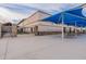 Community pool with ramada provides shade and convenient seating for relaxation at 4557 W South Butte Rd, San Tan Valley, AZ 85144