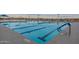Enjoy the community pool featuring lap lanes, clear water, and comfortable lounge area at 4557 W South Butte Rd, San Tan Valley, AZ 85144