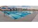 The community pool offers a refreshing escape with its sparkling water and ample shade from umbrellas at 4557 W South Butte Rd, San Tan Valley, AZ 85144