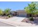 Lovely single-story home with a two-car garage and easy-care desert landscaping at 4557 W South Butte Rd, San Tan Valley, AZ 85144