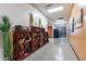 Hallway featuring a large bookcase filled with reading material for community members at 4557 W South Butte Rd, San Tan Valley, AZ 85144