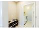Bright laundry area with washer, dryer hookups, and shoe storage at 4557 W South Butte Rd, San Tan Valley, AZ 85144