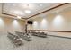 Meeting room with rows of chairs and a long table beneath modern lighting at 4557 W South Butte Rd, San Tan Valley, AZ 85144