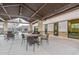 Community ramada featuring stylish patio furniture, stone accents and decorative lighting at 4557 W South Butte Rd, San Tan Valley, AZ 85144