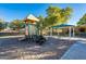 A playground and picnic shelter under a blue sky invite residents to relax, play, and enjoy at 4557 W South Butte Rd, San Tan Valley, AZ 85144
