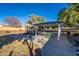 A playground and picnic shelter provide fun and a place to relax in this community park at 4557 W South Butte Rd, San Tan Valley, AZ 85144