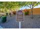 Community signage reminds residents of park hours and expectations for using the park at 4557 W South Butte Rd, San Tan Valley, AZ 85144