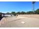 Backyard featuring desert landscaping and a block wall for privacy at 4902 E Charter Oak Rd, Scottsdale, AZ 85254