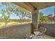 Cozy balcony seating with a view of the lush natural landscape and desert vegetation at 5122 E Shea Blvd # 1020, Scottsdale, AZ 85254