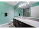Bathroom with a modern vanity, quartz countertop, dark wood cabinets and a walk-in shower at 5122 E Shea Blvd # 1020, Scottsdale, AZ 85254