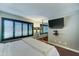Comfortable bedroom with large mirror, contemporary lighting, and a sleek, modern aesthetic at 5122 E Shea Blvd # 1020, Scottsdale, AZ 85254