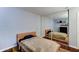 Bedroom with a bed, wood floors, modern decorations and a mirrored closet door at 5122 E Shea Blvd # 1020, Scottsdale, AZ 85254