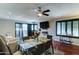 A bright dining room features a glass table, modern fixtures, and opens to a living area at 5122 E Shea Blvd # 1020, Scottsdale, AZ 85254