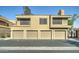 Attractive condo complex featuring multiple garages and well-maintained landscaping at 5122 E Shea Blvd # 1020, Scottsdale, AZ 85254