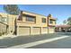 Inviting condo complex exterior with multiple garages and lovely street view at 5122 E Shea Blvd # 1020, Scottsdale, AZ 85254