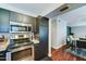 Updated kitchen featuring stainless steel appliances, dark cabinets, and granite countertops at 5122 E Shea Blvd # 1020, Scottsdale, AZ 85254