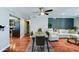 Open floor plan combining dining and living areas with contemporary furnishings at 5122 E Shea Blvd # 1020, Scottsdale, AZ 85254