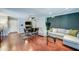 Beautiful open-concept living and dining area with rich hardwood floors and modern design at 5122 E Shea Blvd # 1020, Scottsdale, AZ 85254