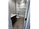 Bathroom featuring a vanity sink, toilet, and a shower-tub combo at 5641 N 205Th Ln, Buckeye, AZ 85396