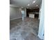 Spacious open plan layout seamlessly connects kitchen and living areas at 5641 N 205Th Ln, Buckeye, AZ 85396