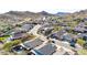 Panoramic aerial view of a desert neighborhood with mountain views and tile-roofed homes at 6506 W Bent Tree Dr, Phoenix, AZ 85083