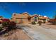 Charming single-Gathering home featuring stucco siding, a well-maintained lawn and concrete driveway at 6520 E Sugarloaf St, Mesa, AZ 85215