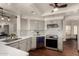 Bright kitchen featuring stainless steel appliances, ample counter space, and modern finishes at 6520 E Sugarloaf St, Mesa, AZ 85215