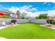 Beautiful backyard with lush green lawn, perfect for outdoor activities and relaxation at 69 E Benrich Dr, Gilbert, AZ 85295