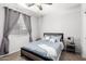 Cozy bedroom with a bed, a window, and carpet flooring for a comfortable living space at 69 E Benrich Dr, Gilbert, AZ 85295