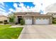 Inviting two-story home featuring a two-car garage and neutral color palette at 69 E Benrich Dr, Gilbert, AZ 85295