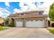 Inviting two-story home featuring a two-car garage and neutral color palette at 69 E Benrich Dr, Gilbert, AZ 85295