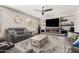 Comfortable living room featuring a modern fireplace, cozy sofa, and stylish decor at 69 E Benrich Dr, Gilbert, AZ 85295