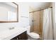 Bathroom with a modern vanity and shower featuring decorative tile accents at 8201 E Piccadilly Rd, Scottsdale, AZ 85251