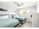 Bright bedroom featuring two twin beds and stylish decor at 8201 E Piccadilly Rd, Scottsdale, AZ 85251