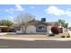 Charming single-story home featuring desert landscaping, and a welcoming appearance at 8201 E Piccadilly Rd, Scottsdale, AZ 85251