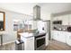 Well-appointed kitchen featuring granite countertops, stainless steel appliances, and a kitchen island at 8201 E Piccadilly Rd, Scottsdale, AZ 85251