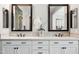 Elegant bathroom featuring double sinks, white cabinetry, quartz countertop, decorative mirrors, and modern fixtures at 937 W Glacier Dr, Chandler, AZ 85248