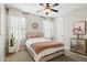 Cozy bedroom with plush bedding, neutral tones, and decorative touches at 937 W Glacier Dr, Chandler, AZ 85248