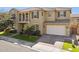 Beautiful home featuring a tile roof, brick driveway, and well-maintained landscaping at 937 W Glacier Dr, Chandler, AZ 85248