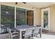 Covered patio with a dining table and chairs, ideal for outdoor entertaining and relaxation at 937 W Glacier Dr, Chandler, AZ 85248