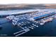 Aerial view of a marina filled with boats docked in the water, offering waterfront recreation at 10038 W Redbird Rd, Peoria, AZ 85383
