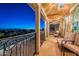 A peaceful balcony offers comfortable seating and a view of the city and nearby mountains at 10038 W Redbird Rd, Peoria, AZ 85383