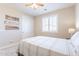 Serene bedroom featuring light-colored walls, a window with shutters, and a cozy bed providing a relaxing atmosphere at 10038 W Redbird Rd, Peoria, AZ 85383