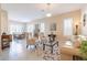 Bright living room featuring stylish furniture, elegant decor, and ample natural light at 10038 W Redbird Rd, Peoria, AZ 85383