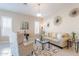 Cozy living room with neutral tones, decorative art, and comfortable furnishings at 10038 W Redbird Rd, Peoria, AZ 85383