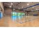 Indoor basketball court featuring a polished wooden floor and ample natural light at 11544 W Ashby Dr, Peoria, AZ 85383