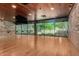 Bright fitness studio with floor to ceiling mirrors and wood floors at 11544 W Ashby Dr, Peoria, AZ 85383