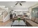 Open floor plan showing a living room that flows into kitchen and dining area at 11544 W Ashby Dr, Peoria, AZ 85383